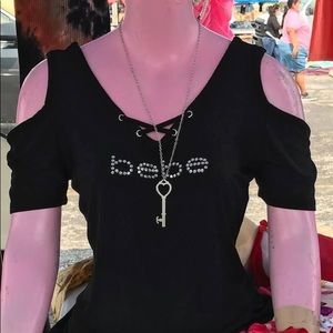 Bebe off the shoulder shirt
